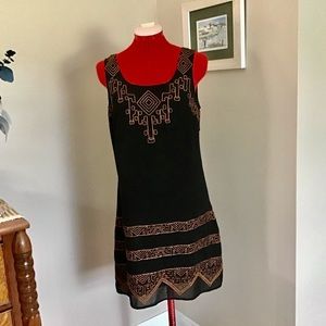 Beautiful black and gold sleeveless dress with Aztec print